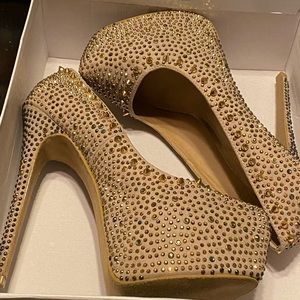 Platform high heel. Only wore once/indoor function